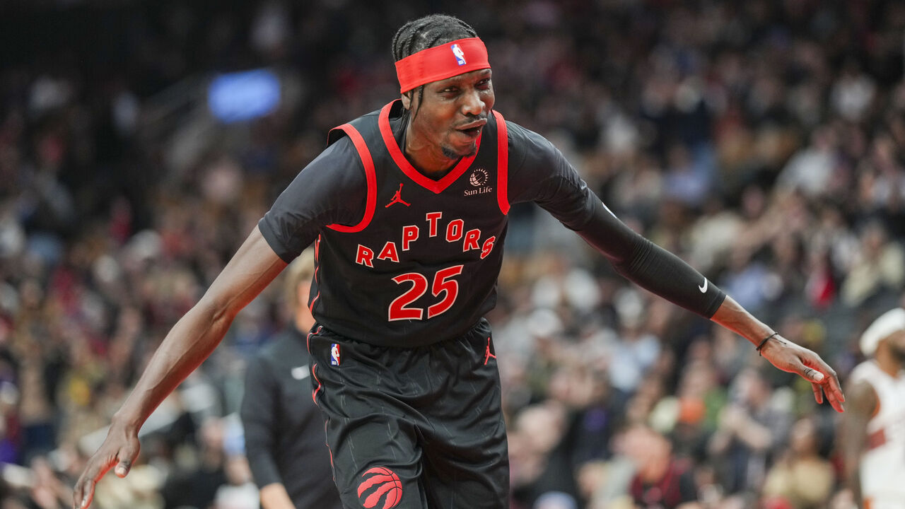TORONTO, CANADA - FEBRUARY 23: Chris Boucher #25 of the Toronto Raptors celebrates during the second half against the Phoenix Suns at Scotiabank Arena on February 23, 2025 in Toronto, Canada.