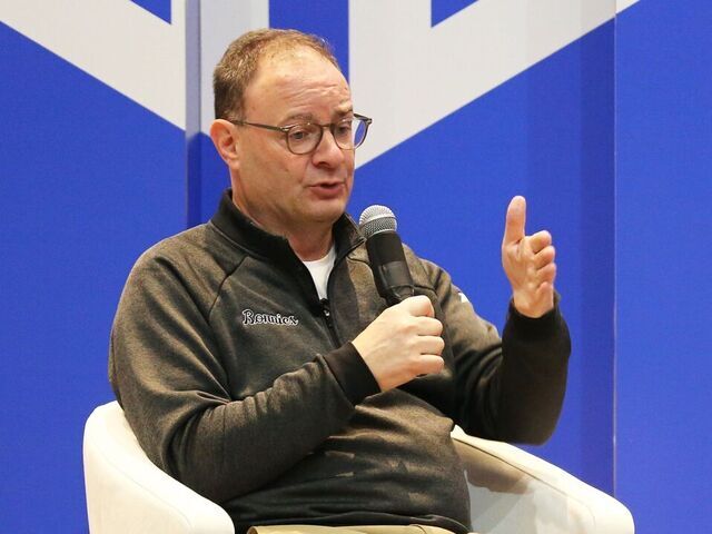 TORONTO, ON - January 12 Adrian "Woj" Wojnarowski (left) speaking at a panel with Jamal Shead and moderated by Randy Osei (right). Former ESPN Insider Adrian "Woj" Wojnarowski and Toronto Raptors' Jamal Shead talk at the inaugural Training Ground Summit, moderated by Randy Osei of TRAININGGROUND AI. January 12 2025 Michelle Mengsu Chang/Toronto Star Michelle Mengsu Chang/Toronto Star (Michelle Mengsu Chang/Toronto Star via Getty Images)