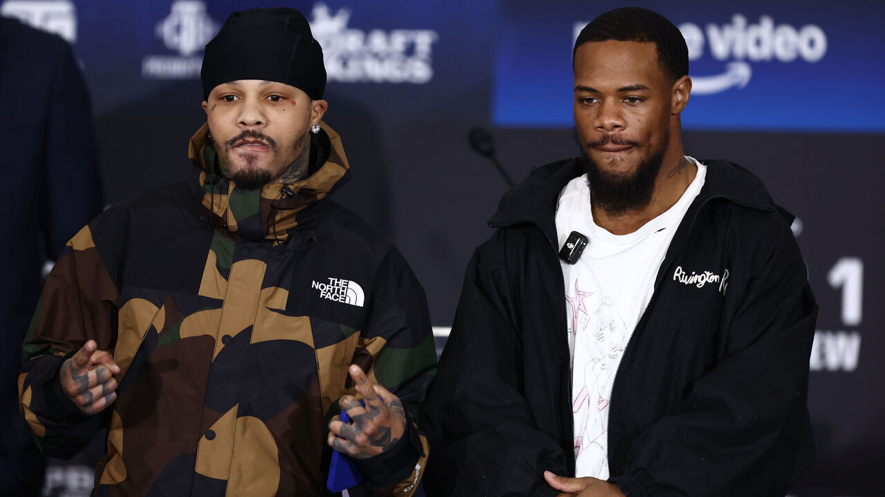 WASHINGTON, DC - DECEMBER 05: Gervonta Davis (L) and Lamont Roach Jr. pose for photos during a pre-bout press conference at Burr Gymnasium on the campus of Howard University on December 05, 2024 in Washington, DC.