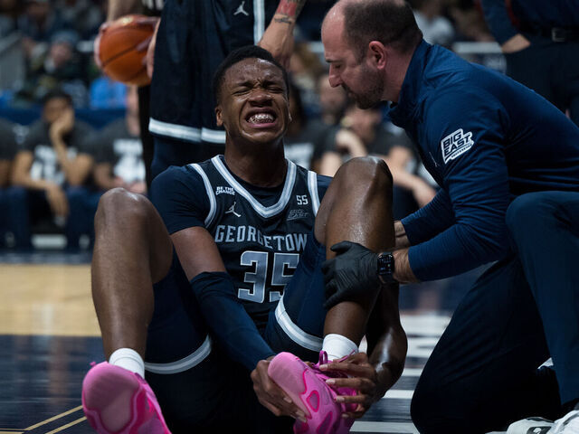 INDIANAPOLIS, IN - FEBRUARY 15: Georgetown Hoyas forward Thomas Sorber (35) gets injured during the men's college basketball game between the Butler Bulldogs and Georgetown Hoyas on February 15, 2025, at Hinkle Fieldhouse in Indianapolis, IN.