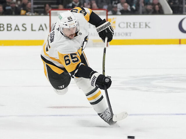 SAN JOSE, CALIFORNIA - JANUARY 27: Erik Karlsson #65 of the Pittsburgh Penguins shoots on goal against the San Jose Sharks during the third period of an NHL hockey game at SAP Center on January 27, 2025 in San Jose, California.