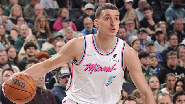 MILWAUKEE, WI - FEBRUARY 23: Nikola Jovic #5 of the Miami Heat drives to the basket during the game against the Milwaukee Bucks on February 23, 2025 at Fiserv Forum Center in Milwaukee, Wisconsin. Mandatory Copyright Notice: Copyright 2025 NBAE .
