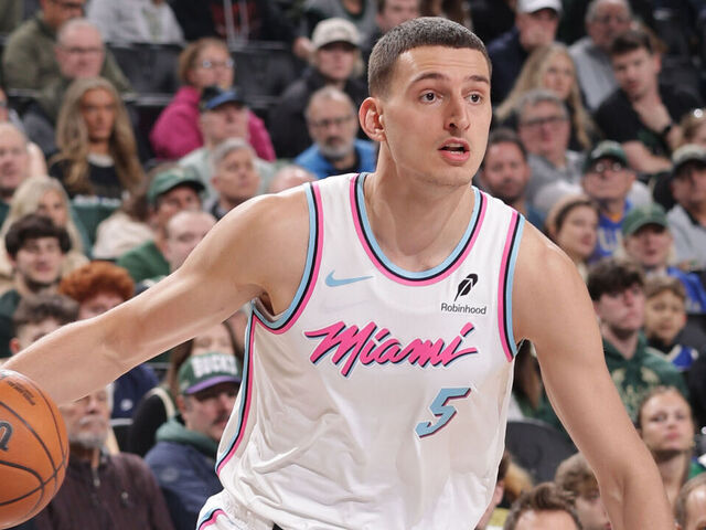 MILWAUKEE, WI - FEBRUARY 23: Nikola Jovic #5 of the Miami Heat drives to the basket during the game against the Milwaukee Bucks on February 23, 2025 at Fiserv Forum Center in Milwaukee, Wisconsin. Mandatory Copyright Notice: Copyright 2025 NBAE .