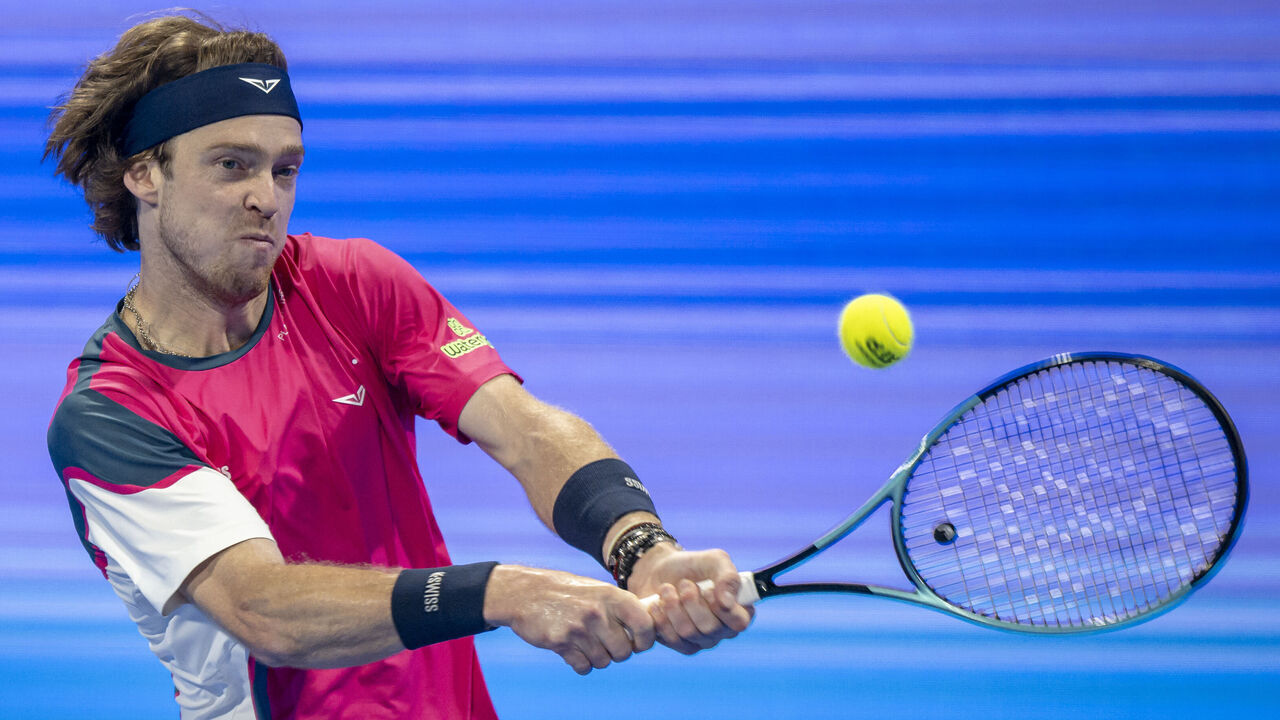Andrey Rublev of Russia competes with Jack Draper of Britain during the final match of the ATP Qatar ExxonMobil Open 2025 tennis tournament at the Khalifa International Tennis Complex in Doha, Qatar, on February 22, 2025.