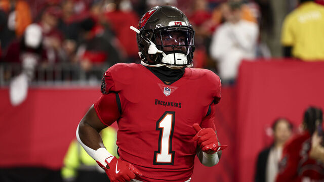 TAMPA, FLORIDA - JANUARY 12: Rachaad White #1 of the Tampa Bay Buccaneers warms up prior to an NFL football wild card playoff game against the Washington Commanders at Raymond James Stadium on January 12, 2025 in Tampa, Florida.