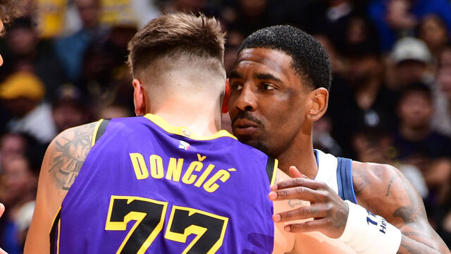 LOS ANGELES, CA - FEBRUARY 25: Kyrie Irving #11 of the Dallas Mavericks and Luka Doncic #77 of the Los Angeles Lakers hug before the game on February 25, 2025 at Crypto.Com Arena in Los Angeles, California. NOTE TO USER: User expressly acknowledges and agrees that, by downloading and/or using this Photograph, user is consenting to the terms and conditions of the Getty Images License Agreement. Mandatory Copyright Notice: Copyright 2025 NBAE