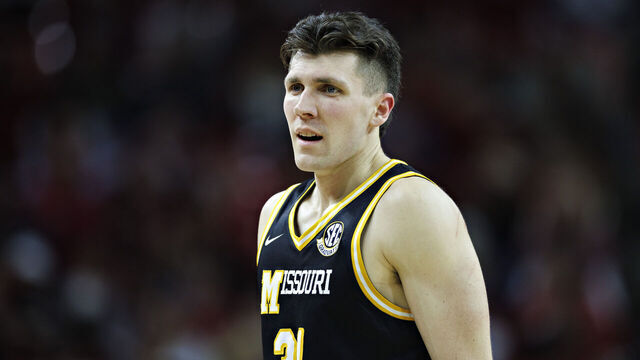 FAYETTEVILLE, ARKANSAS - FEBRUARY 22: Caleb Grill #31 of the Missouri Tigers on the court during a game against the Arkansas Razorbacks at Bud Walton Arena on February 22, 2025 in Fayetteville, Arkansas. The Razorbacks defeated the Tigers 92-85.