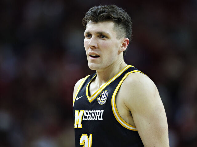 FAYETTEVILLE, ARKANSAS - FEBRUARY 22: Caleb Grill #31 of the Missouri Tigers on the court during a game against the Arkansas Razorbacks at Bud Walton Arena on February 22, 2025 in Fayetteville, Arkansas. The Razorbacks defeated the Tigers 92-85.