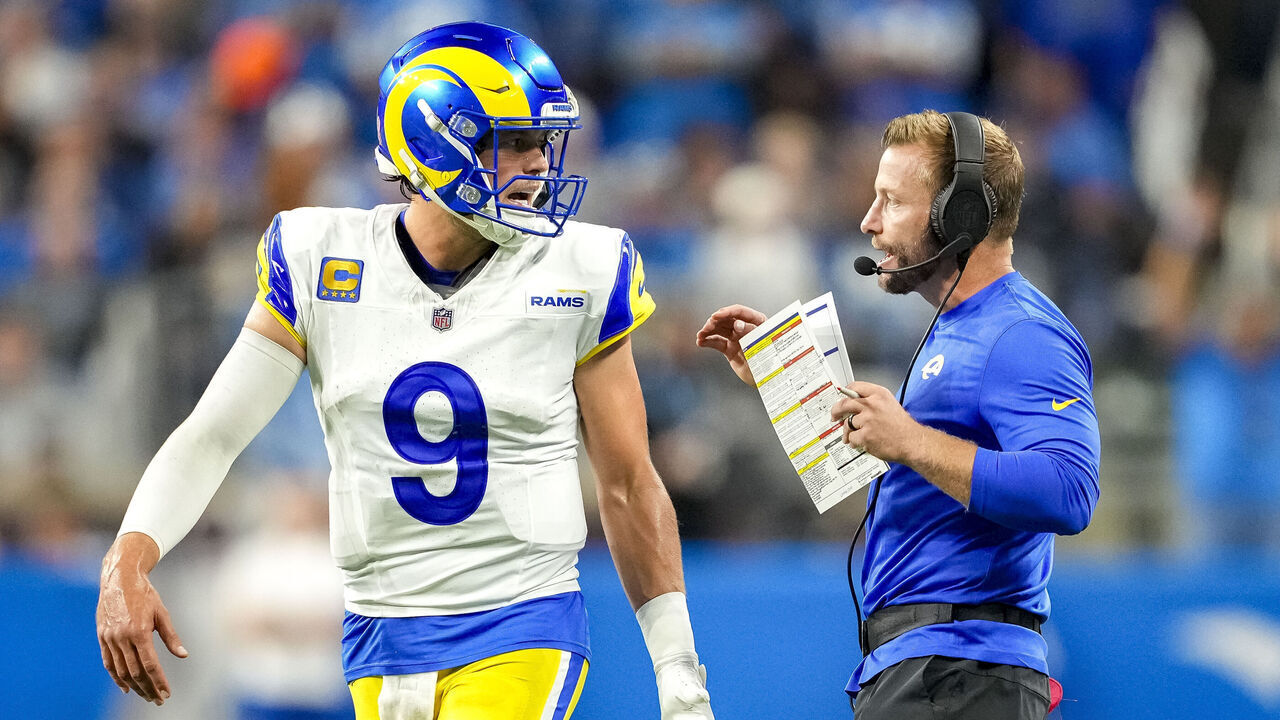 DETROIT, MICHIGAN - SEPTEMBER 08: Head coach Sean McVay of the Los Angeles Rams speaks with Matthew Stafford #9 during their game against the Detroit Lions at Ford Field on September 08, 2024 in Detroit, Michigan.