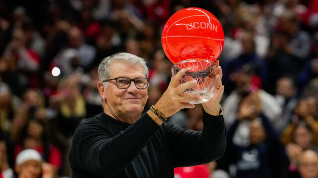 STORRS, CONNECTICUT - NOVEMBER 20: Connecticut Huskies head coach Geno Auriemma is honored for her 40th season before an NCAA women's basketball game against the Fairleigh Dickinson Knights at the Harry A. Gampel Pavilion on November 20, 2024 in Storrs, Connecticut.