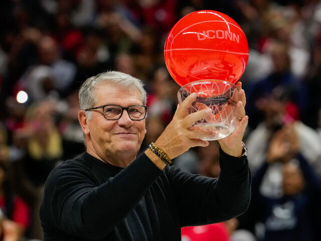 STORRS, CONNECTICUT - NOVEMBER 20: Connecticut Huskies head coach Geno Auriemma is honored for her 40th season before an NCAA women's basketball game against the Fairleigh Dickinson Knights at the Harry A. Gampel Pavilion on November 20, 2024 in Storrs, Connecticut.