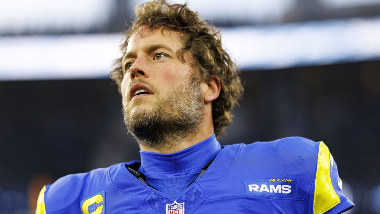 INGLEWOOD, CALIFORNIA - DECEMBER 28: Quarterback Matthew Stafford #9 of the Los Angeles Rams stretches prior to an NFL football game against the Arizona Cardinals, at SoFi Stadium on December 28, 2024 in Inglewood, California.