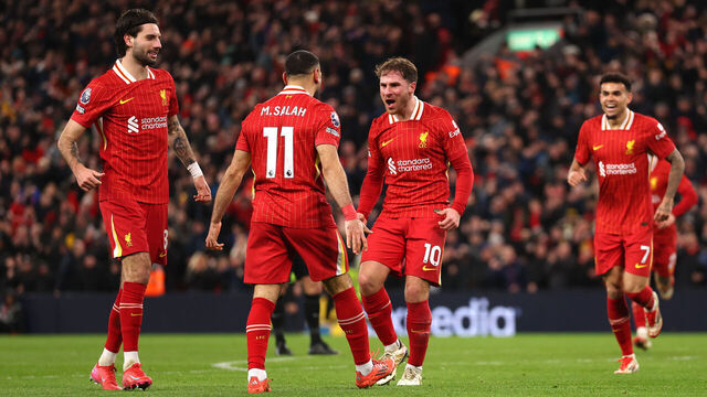 LIVERPOOL, ENGLAND - FEBRUARY 26: Alexis Mac Allister of Liverpool celebrates scoring his team's second goal with teammate Mohamed Salah during the Premier League match between Liverpool FC and Newcastle United FC at Anfield on February 26, 2025 in Liverpool, England.