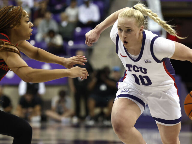 FORT WORTH, TX-FEBRUARY 26: Hailey Van Lith #10 of the TCU Horned Frogs dribbles the ball to the basket as Gigi Cooke #3 of the Houston Cougars defends in the first half at Schollmaier Arena on February 26, 2025 in Fort Worth, Texas.