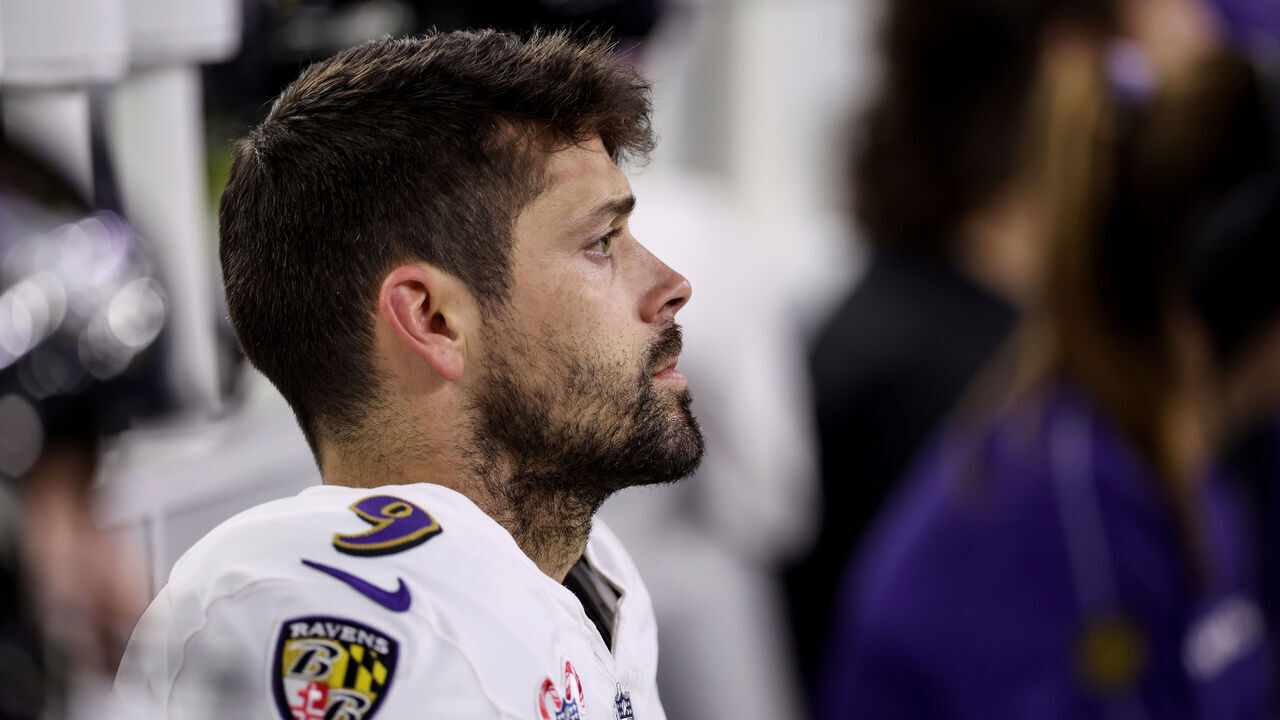 HOUSTON, TEXAS - DECEMBER 25: Justin Tucker #9 of the Baltimore Ravens sits on the bench in the second half against the Houston Texans at NRG Stadium on December 25, 2024 in Houston, Texas.