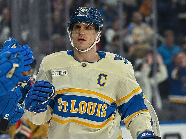 ST. LOUIS, MO - FEBRUARY 8: Brayden Schenn #10 of the St. Louis Blues is congratulated after scoring a goal against the Chicago Blackhawks during the shootout on February 8, 2025 at the Enterprise Center in St. Louis, Missouri.
