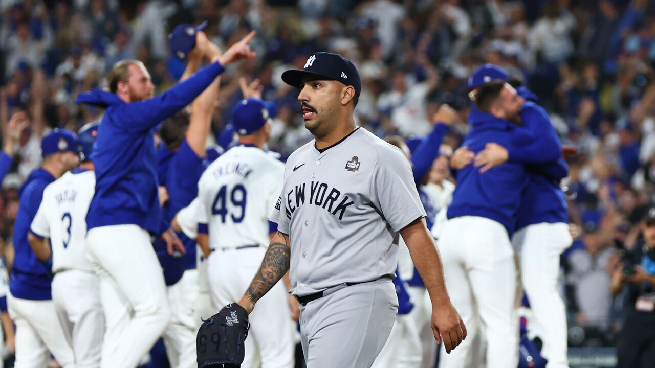 LOS ANGELES, CALIFORNIA - OCTOBER 25: Nestor Cortes #65 of the New York Yankees leaves the field after giving up a walk-off grand slam to Freddie Freeman #5 of the Los Angeles Dodgers in the tenth inning during Game One of the 2024 World Series at Dodger Stadium on October 25, 2024 in Los Angeles, California.