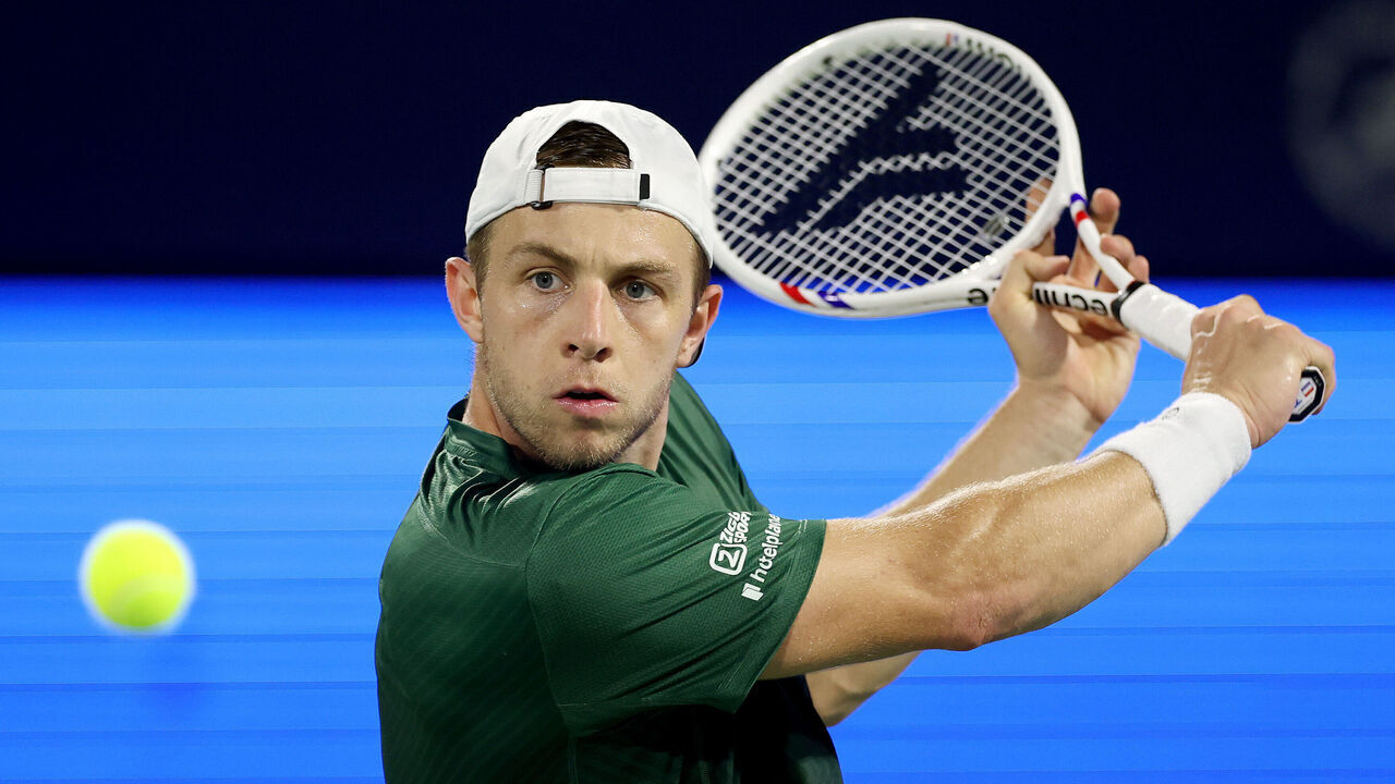 DUBAI, UNITED ARAB EMIRATES - FEBRUARY 27: Tallon Griekspoor of the Netherlands in action against Daniil Medvedev in their quarter final match during day twelve of the Dubai Duty Free Tennis Championships at Dubai Duty Free Tennis Stadium on February 27, 2025 in Dubai, United Arab Emirates.