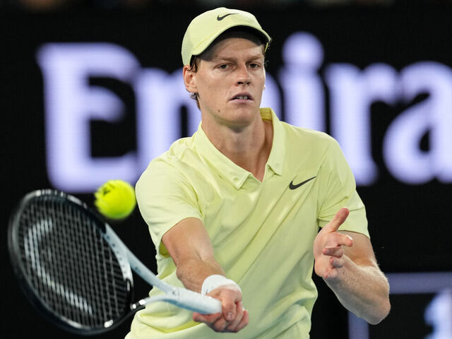 MELBOURNE, AUSTRALIA - JANUARY 26: Jannik Sinner of Italy plays a forehand in the Men's Singles Final match against Alexander Zverev of Germany during day fifteen of the 2025 Australian Open at Melbourne Park on January 26, 2025 in Melbourne, Australia.