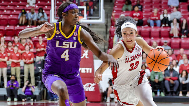 TUSCALOOSA, ALABAMA - FEBRUARY 27: Aaliyah Nye #32 of the Alabama Crimson Tide drives against Flau'Jae Johnson #4 of the LSU Lady Tigers during the second half at Coleman Coliseum on February 27, 2025 in Tuscaloosa, Alabama.