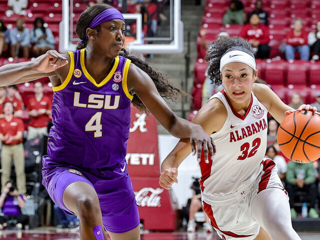 TUSCALOOSA, ALABAMA - FEBRUARY 27: Aaliyah Nye #32 of the Alabama Crimson Tide drives against Flau'Jae Johnson #4 of the LSU Lady Tigers during the second half at Coleman Coliseum on February 27, 2025 in Tuscaloosa, Alabama.