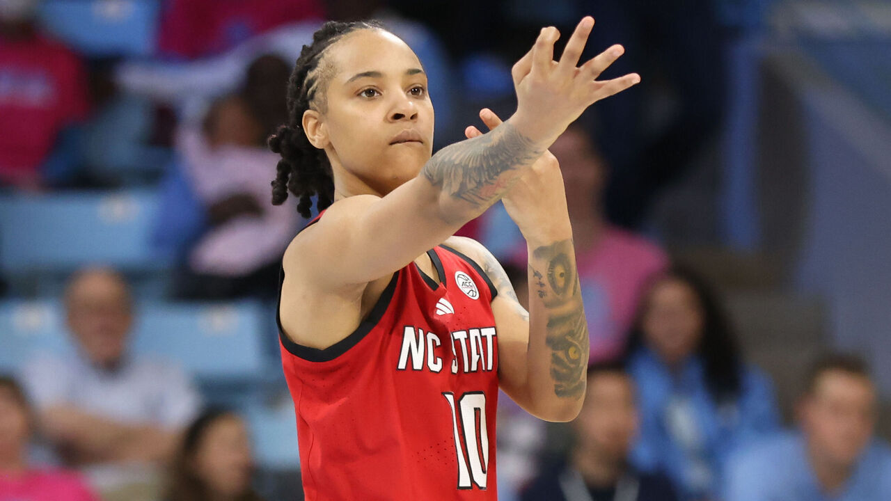 CHAPEL HILL, NC - FEBRUARY 16: NC State Wolfpack guard Aziaha James (10) celebrates the three point basket during the college basketball game between the North Carolina Tar Heels and the NC State Wolfpack on February 16, 2025 at Carmichael Arena in Chapel Hill, NC.
