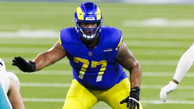 INGLEWOOD, CALIFORNIA - NOVEMBER 11: Alaric Jackson #77 of the Los Angeles Rams blocks during the second half against the Miami Dolphins at SoFi Stadium on November 11, 2024 in Inglewood, California.