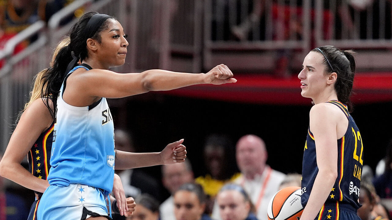 INDIANAPOLIS, INDIANA - JUNE 16: Angel Reese #5 of the Chicago Sky reacts after fouling Caitlin Clark #22 of the Indiana Fever during the second half at Gainbridge Fieldhouse on June 16, 2024 in Indianapolis, Indiana.
