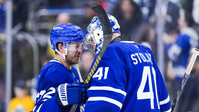 TORONTO, ON - NOVEMBER 5: Jake McCabe #22 of the Toronto Maple Leafs congratulatex teammate Anthony Stolarz #41 on his shut out against the Boston Bruins at the Scotiabank Arena on November 5, 2024 in Toronto, Ontario, Canada.