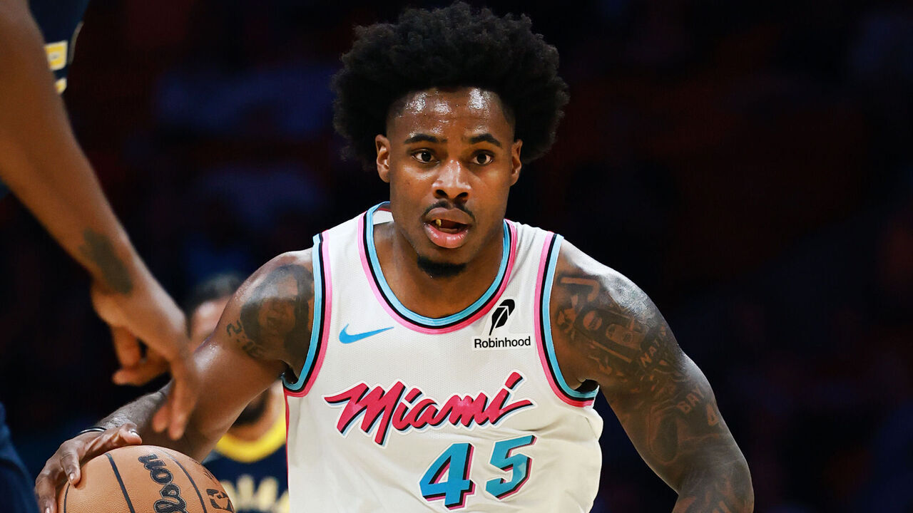MIAMI, FLORIDA - FEBRUARY 28: Davion Mitchell #45 of the Miami Heat controls the ball against the Indiana Pacers during the first half at Kaseya Center on February 28, 2025 in Miami, Florida.