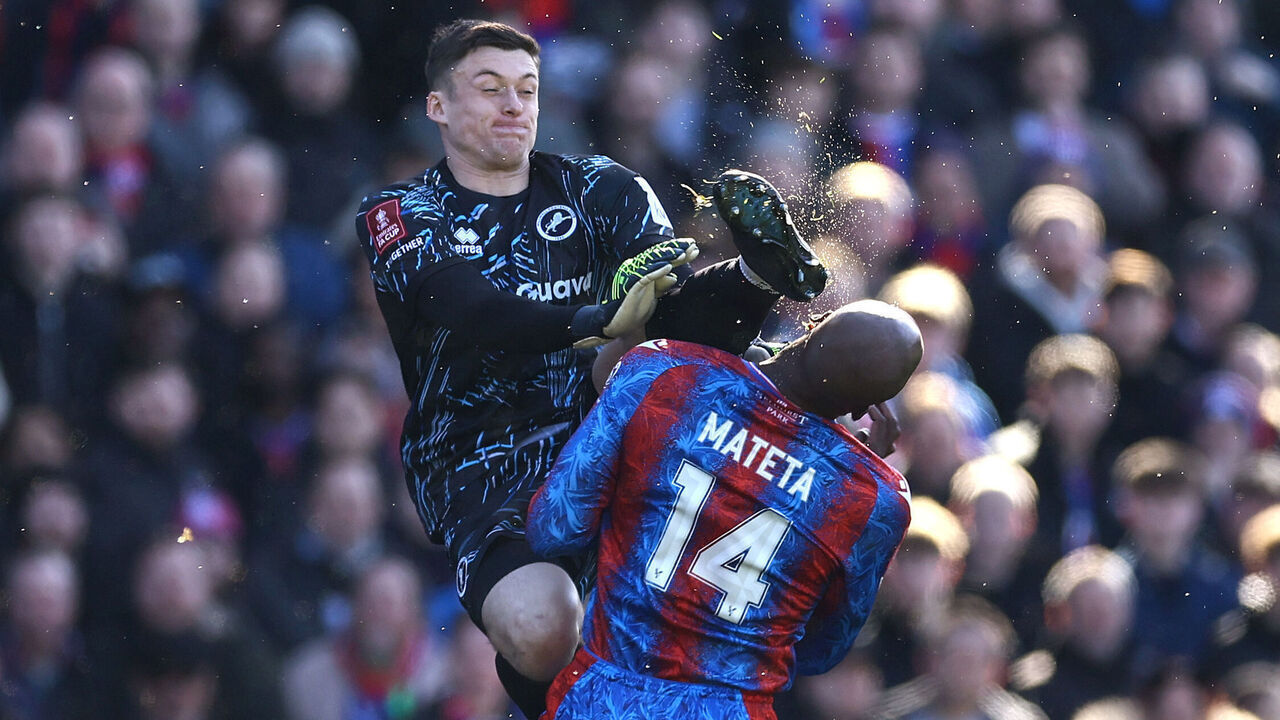 LONDON, ENGLAND - MARCH 1: Millwall goalkeeper Liam Roberts karate kicks Jean-Philippe Mateta of Crystal Palace in the head and is subsequently sent off for a dangerous tackle during the Emirates FA Cup Fifth Round match between Crystal Palace and Millwall at Selhurst Park on March 1, 2025 in London, England.