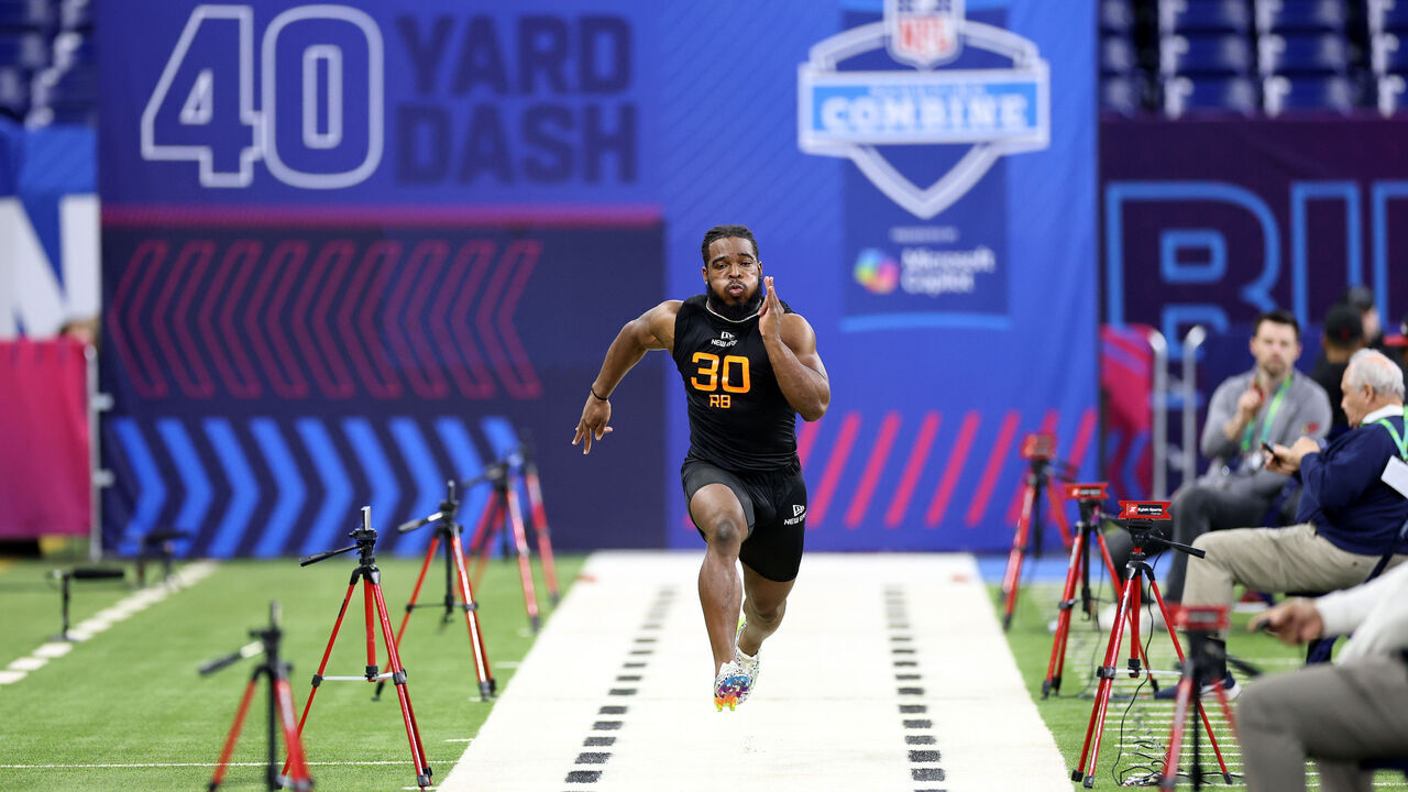 INDIANAPOLIS, INDIANA - MARCH 01: Bhayshul Tuten #RB30 of Virginia Tech participates in a drill during the NFL Scouting Combine at Lucas Oil Stadium on March 01, 2025 in Indianapolis, Indiana.