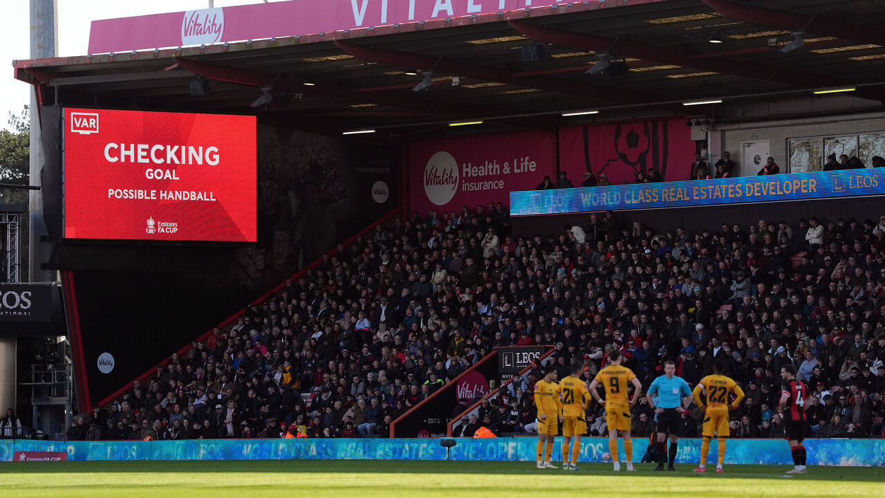 Referee Sam Barrott waits on the VAR decision before they rule out a second goal for Bournemouth during the Emirates FA Cup fifth round match at the Vitality Stadium, Bournemouth. Picture date: Saturday March 1, 2025.