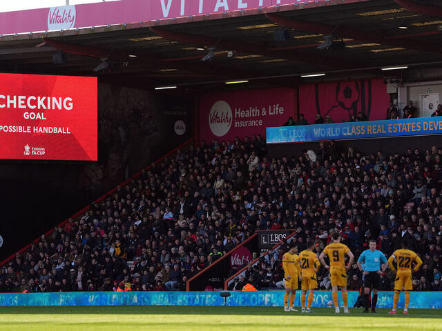 Referee Sam Barrott waits on the VAR decision before they rule out a second goal for Bournemouth during the Emirates FA Cup fifth round match at the Vitality Stadium, Bournemouth. Picture date: Saturday March 1, 2025.