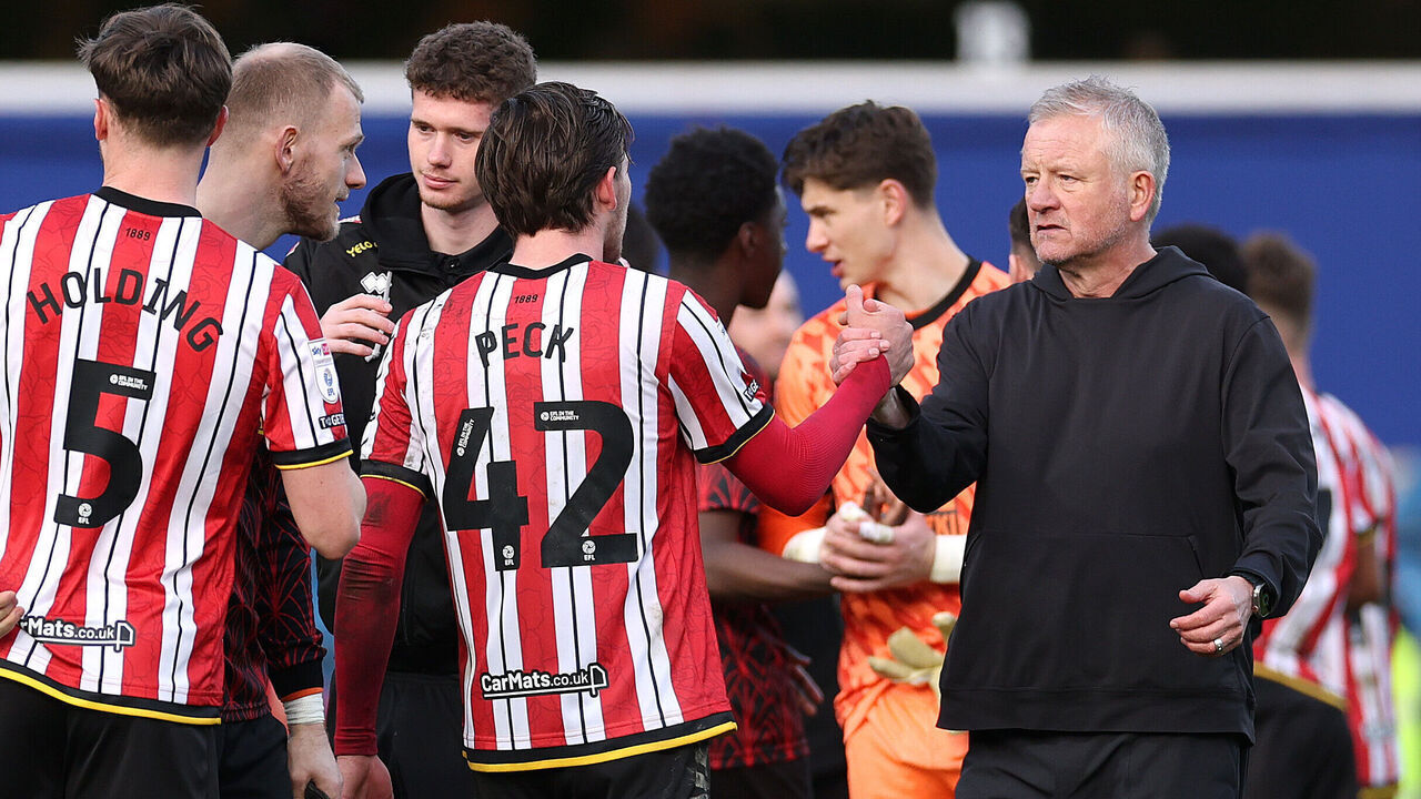 LONDON, ENGLAND - MARCH 01: Chris Wilder, Sheffield United manager shakes hands with his players after the final whistle in the Sky Bet Championship match between Queens Park Rangers FC and Sheffield United FC at Loftus Road on March 01, 2025 in London, England.