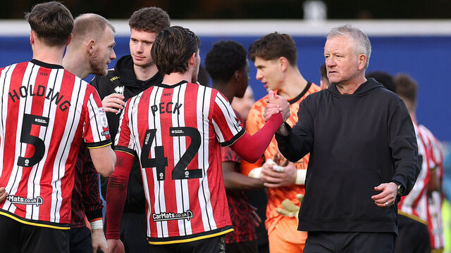 LONDON, ENGLAND - MARCH 01: Chris Wilder, Sheffield United manager shakes hands with his players after the final whistle in the Sky Bet Championship match between Queens Park Rangers FC and Sheffield United FC at Loftus Road on March 01, 2025 in London, England.