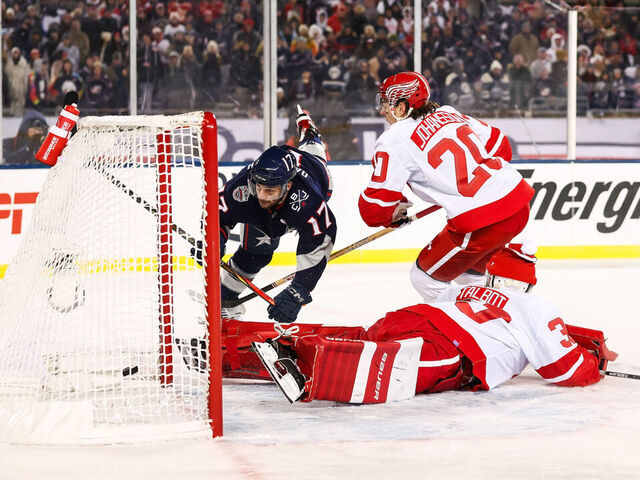 COLUMBUS, OHIO - MARCH 1: Justin Danforth #17 of the Columbus Blue Jackets scores against the Detroit Red Wings in the third period during the NHL Stadium Series at Ohio Stadium on March 1, 2025 in Columbus, Ohio.