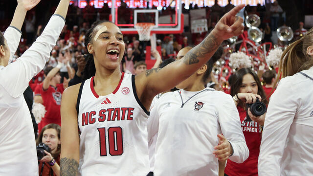 RALEIGH, NC - FEBRUARY 23: NC State Wolfpack guard Aziaha James (10) points to the crowd during the college basketball game between the NC State Wolfpack and the Notre Dame Fighting Irish on February 23, 2025 at Reynolds Coliseum in Raleigh, NC.