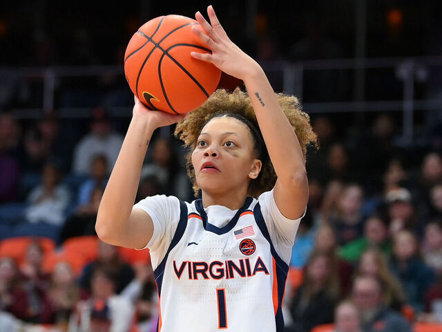 SYRACUSE, NEW YORK - FEBRUARY 2: Paris Clark #1 of the Virginia Cavaliers shoots against the Syracuse Orange during the second half at the JMA Wireless Dome on February 2, 2025 in Syracuse, New York. Virginia won 70-67.