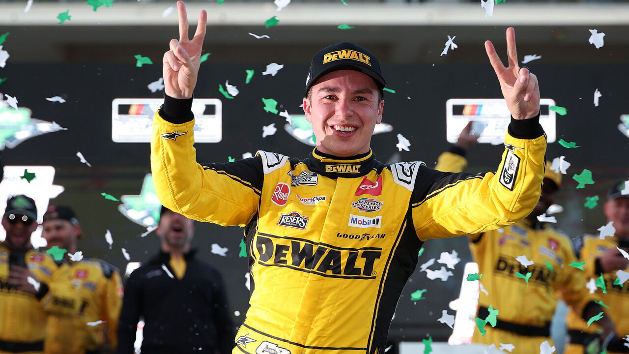 AUSTIN, TEXAS - MARCH 02: Christopher Bell, driver of the #20 DEWALT Toyota, celebrates in victory lane after winning the NASCAR Cup Series EchoPark Automotive Grand Prix at Circuit of The Americas on March 02, 2025 in Austin, Texas.