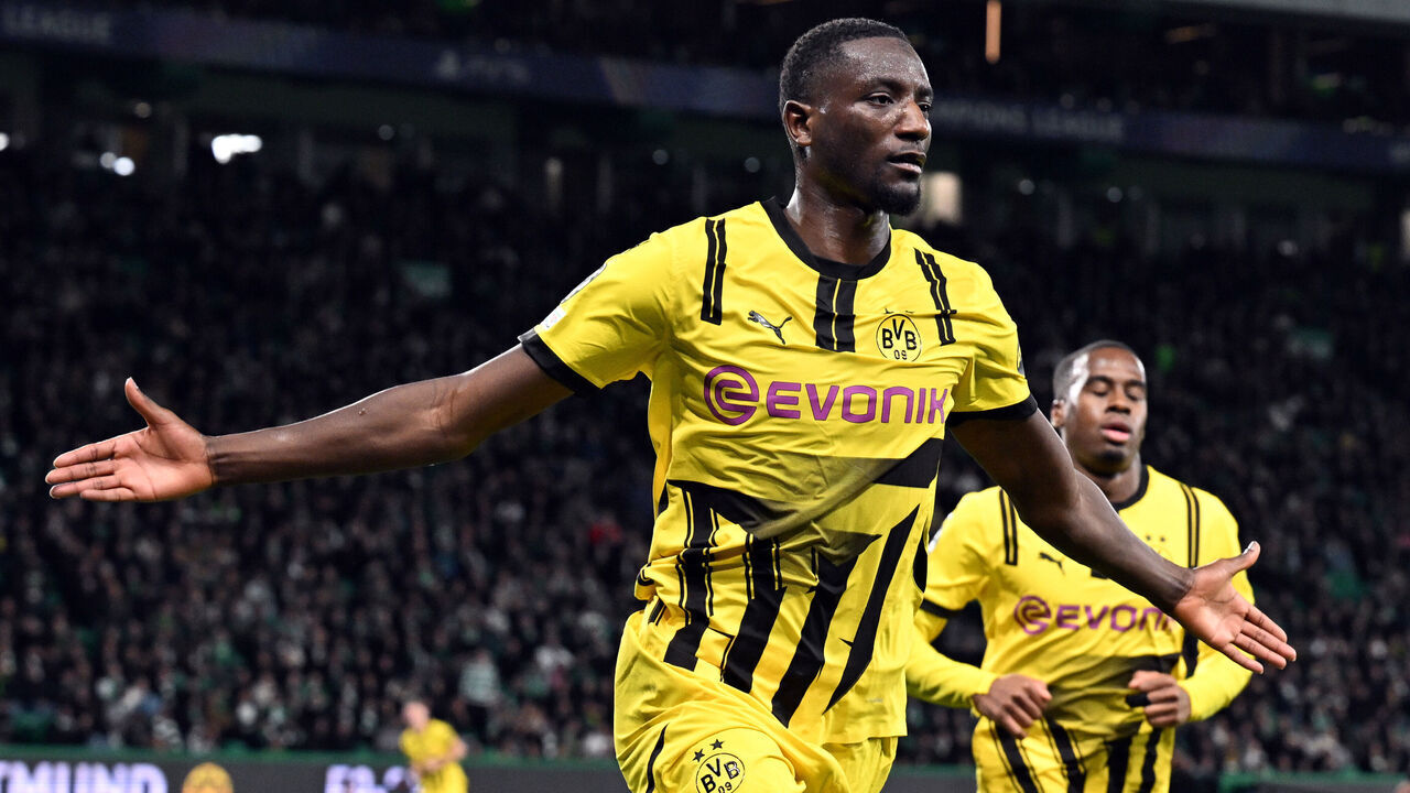 11 February 2025, Portugal, Lissabon: Soccer: Champions League, Sporting Lisbon - Borussia Dortmund, knockout round, first leg, Estádio José Alvalade XXI, Dortmund's Sehrou Guirassy celebrates his goal for 1:0. Photo: Federico Gambarini/dpa