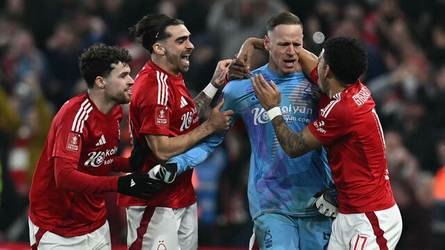 TOPSHOT - Nottingham Forest's Belgian goalkeeper #26 Matz Sels (2R) is congratulated by teammates after saving a penalty from Ipswich Town's Irish midfielder #14 Jack Taylor to win the penalty shoot-out during the English FA Cup fifth round football match between Nottingham Forest and Ipswich Town at The City Ground in Nottingham, central England, on March 3, 2025. Forest won the penalty shoot-out 5-4 after the game finished 1-1 after extra time.