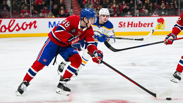 MONTREAL, QC - MARCH 03: Montreal Canadiens defenseman Lane Hutson (48) plays the puck during the Buffalo Sabres versus the Montreal Canadiens game on March 03, 2025, at Bell Centre in Montreal, QC