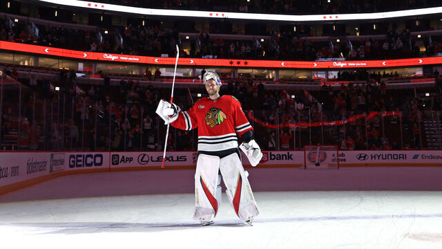 CHICAGO, ILLINOIS - MARCH 03: Goalie Spencer Knight #30 of the Chicago Blackhawks is named number one player of the game with 31 saves against the Los Angeles Kings at the United Center on March 03, 2025 in Chicago, Illinois.