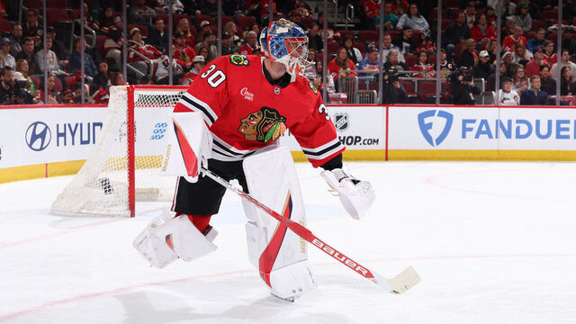 CHICAGO, ILLINOIS - MARCH 03: Goalie Spencer Knight #30 of the Chicago Blackhawks skates in the first period against the Los Angeles Kings at the United Center on March 03, 2025 in Chicago, Illinois.