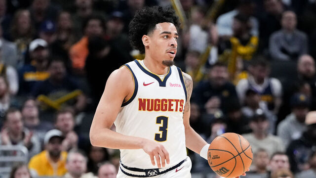 INDIANAPOLIS, INDIANA - FEBRUARY 24: Julian Strawther #3 of the Denver Nuggets dribbles the ball in the second quarter against the Indiana Pacers at Gainbridge Fieldhouse on February 24, 2025 in Indianapolis, Indiana.