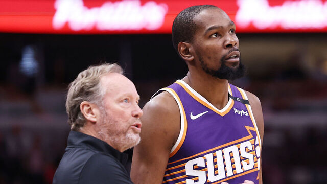 CHICAGO, ILLINOIS - FEBRUARY 22: Kevin Durant #35 of the Phoenix Suns gets instructions from head coach Mike Budenholzer during the fourth quarter against the Chicago Bulls at the United Center on February 22, 2025 in Chicago, Illinois.