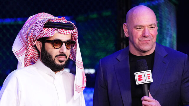 RIYADH, SAUDI ARABIA - JUNE 22: (L-R) Jon Anik, His Excellency Turki Alalshikh, and UFC CEO Dana White are seen on the broadcast during the UFC Fight Night event at Kingdom Arena on June 22, 2024 in Riyadh, Saudi Arabia.