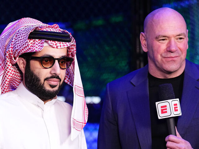 RIYADH, SAUDI ARABIA - JUNE 22: (L-R) Jon Anik, His Excellency Turki Alalshikh, and UFC CEO Dana White are seen on the broadcast during the UFC Fight Night event at Kingdom Arena on June 22, 2024 in Riyadh, Saudi Arabia.