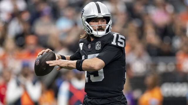 LAS VEGAS, NEVADA - NOVEMBER 24: Gardner Minshew #15 of the Las Vegas Raiders looks to pass during an NFL Football game against the Denver Broncos at Allegiant Stadium on November 24, 2024 in Las Vegas, Nevada.